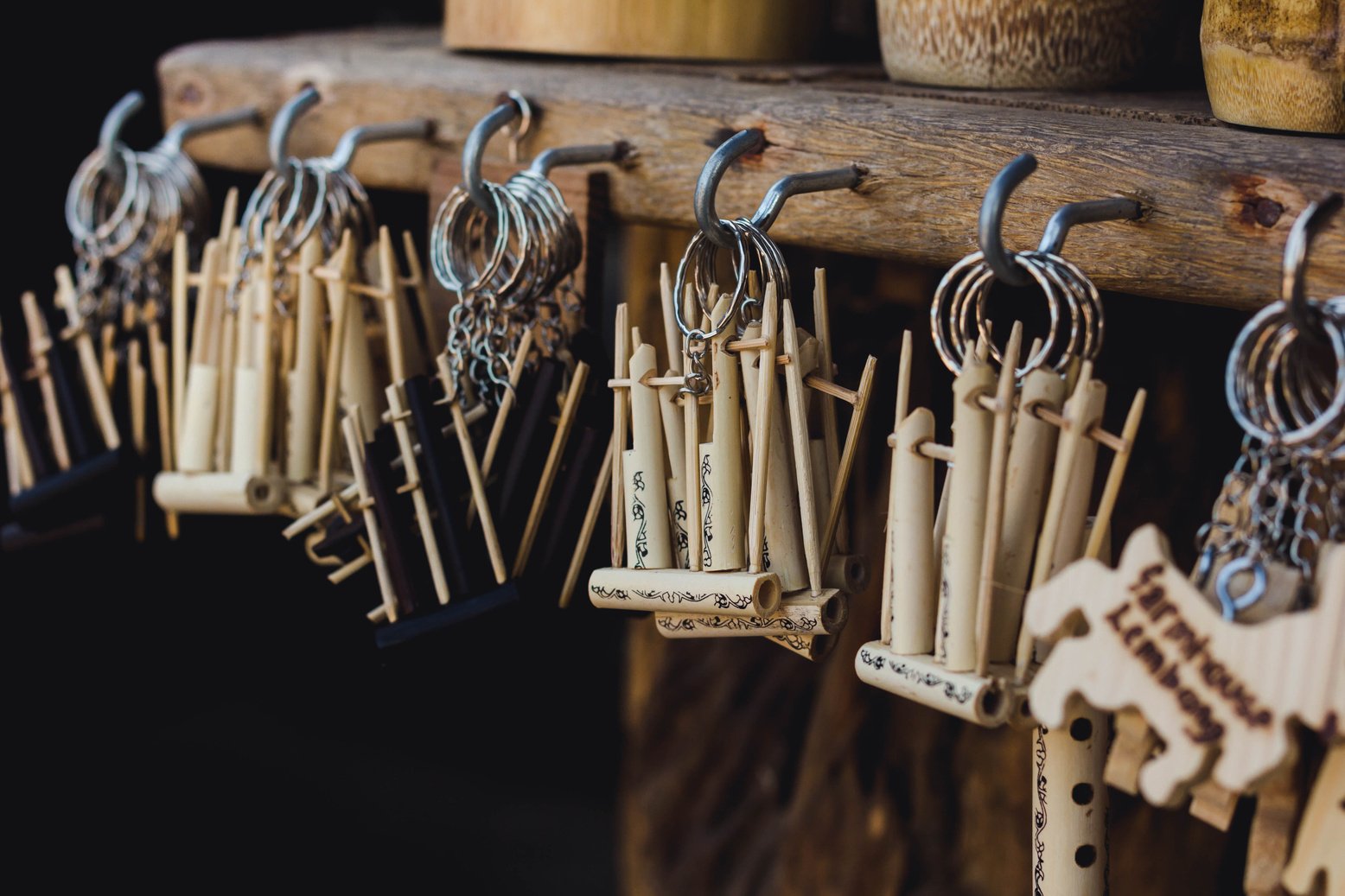 Brown Wind Instruments Hanging on Hooks